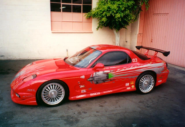 Deep Dive Dominic Toretto's Mazda RX-7 from "Wild Speed".