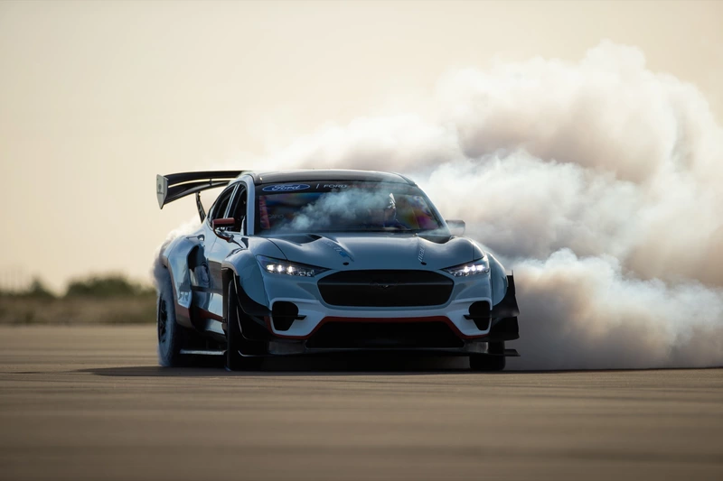 Ken Block in his Ford Mustang Mach E 1400 blows a tire.