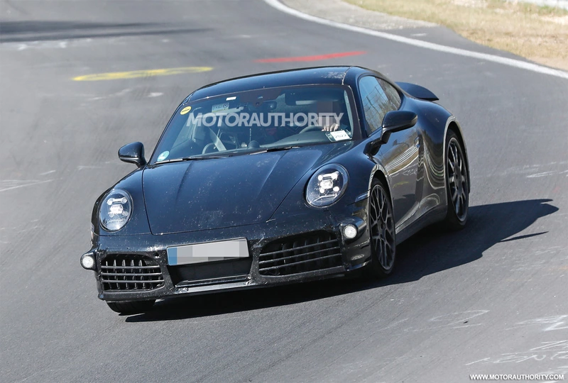 Spy shots of the 2024 Porsche 911 Hybrid: the electrified sports car is here.